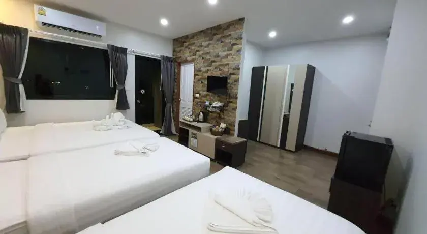 Bed in Rainbow Sky Hotel Samet Bed in Rainbow Sky Hotel Samet