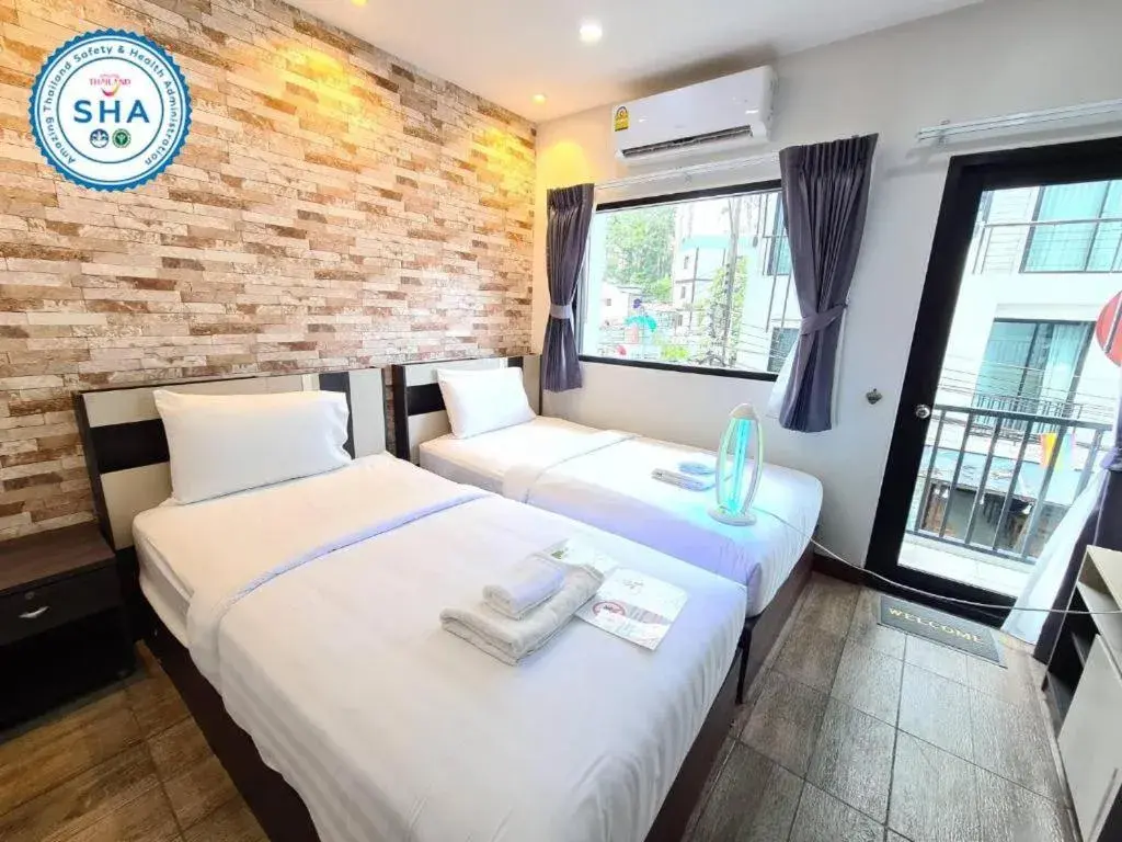 Bed in Rainbow Sky Hotel Samet Bed in Rainbow Sky Hotel Samet
