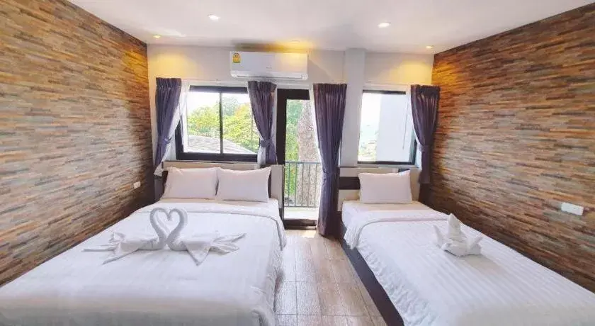 Bed in Rainbow Sky Hotel Samet Bed in Rainbow Sky Hotel Samet