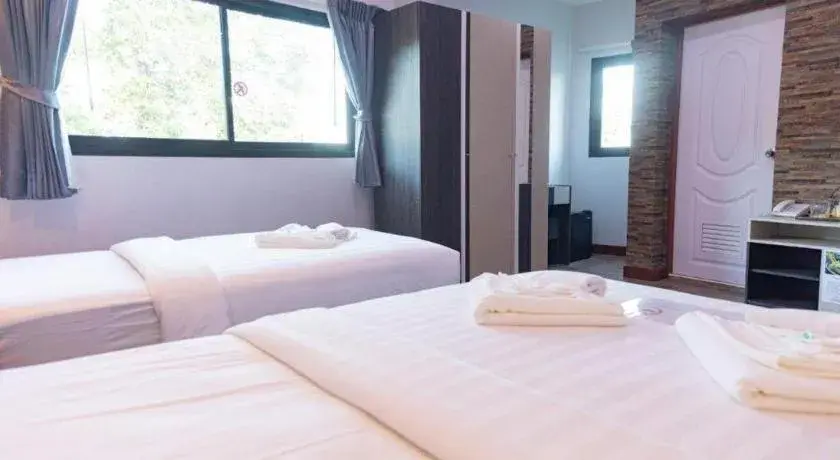 Bed in Rainbow Sky Hotel Samet Bed in Rainbow Sky Hotel Samet