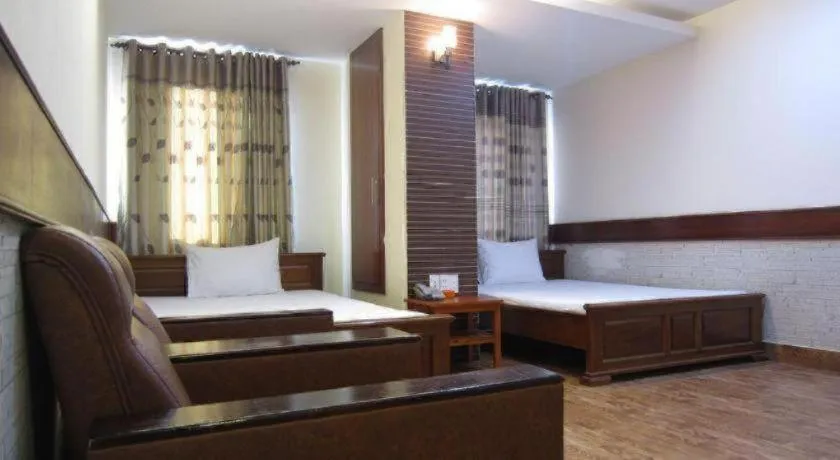 Bed in Melody Viet Hotel