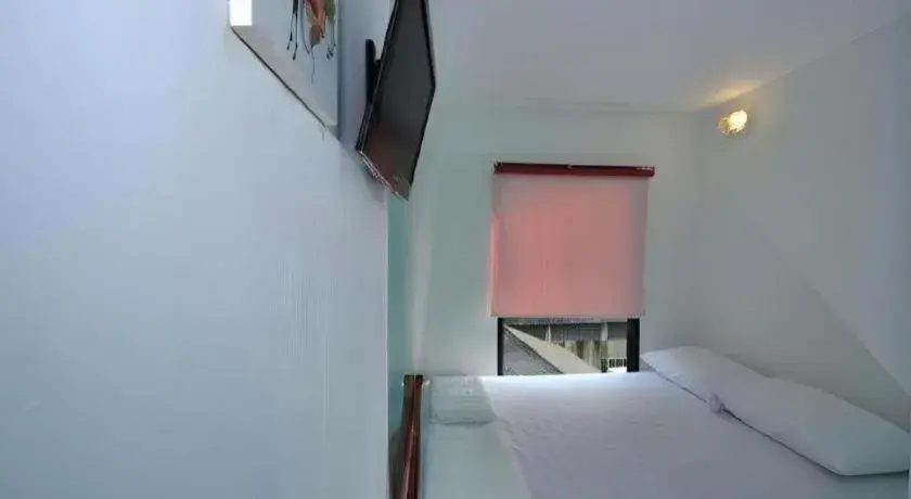 Bed in The Chilli Bangkok Hotel Bed in The Chilli Bangkok Hotel