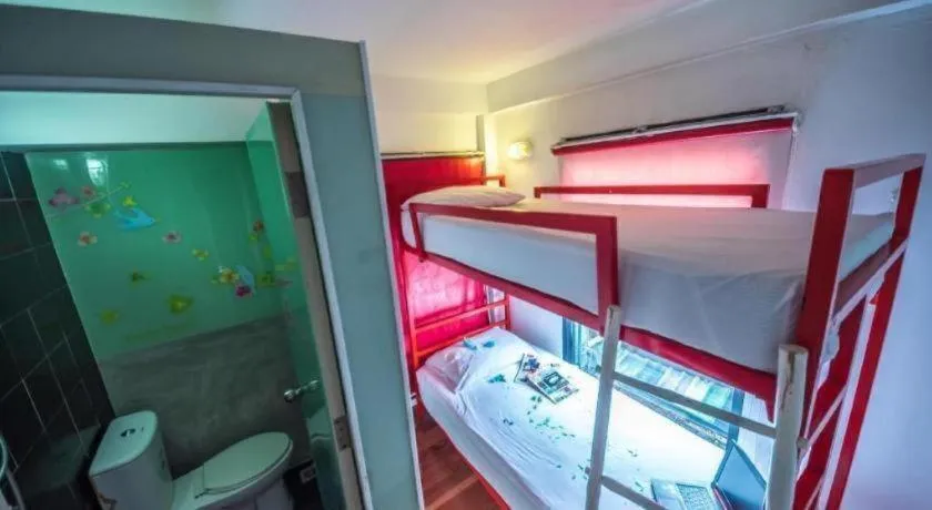 Bed in The Chilli Bangkok Hotel