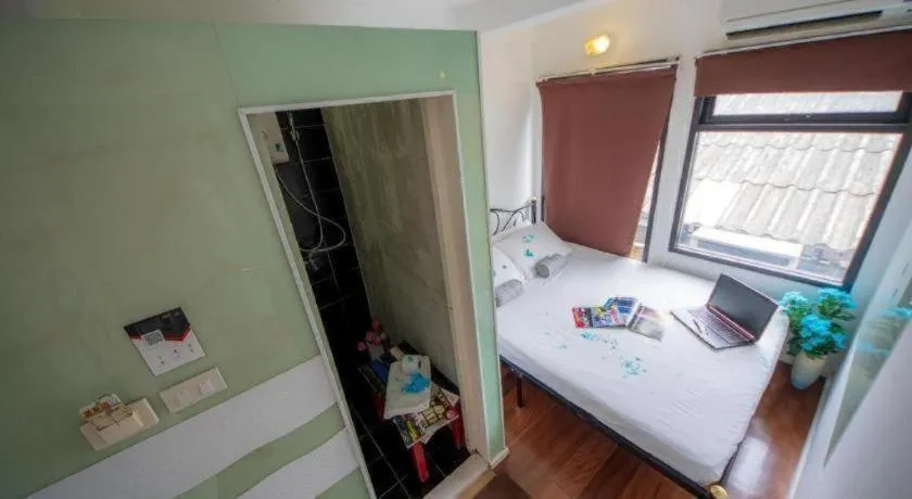 Bed in The Chilli Bangkok Hotel