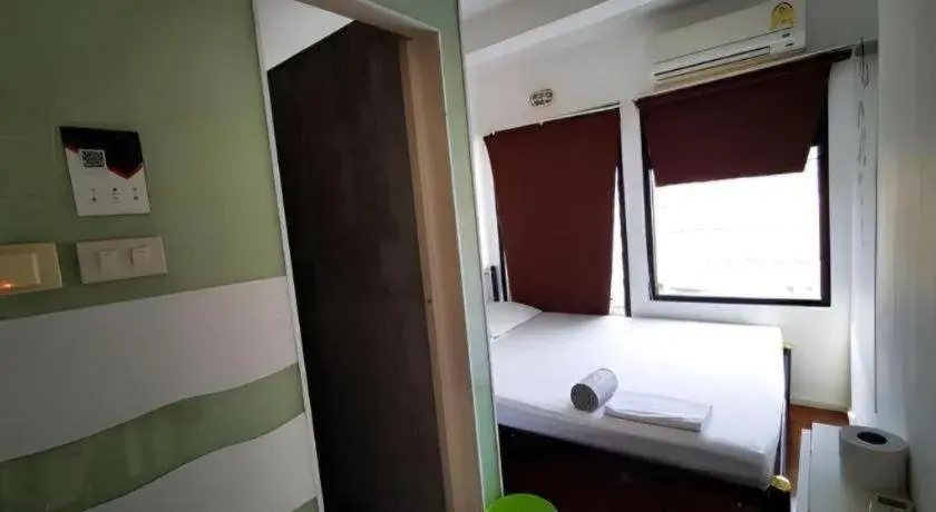 Bed in The Chilli Bangkok Hotel Bed in The Chilli Bangkok Hotel