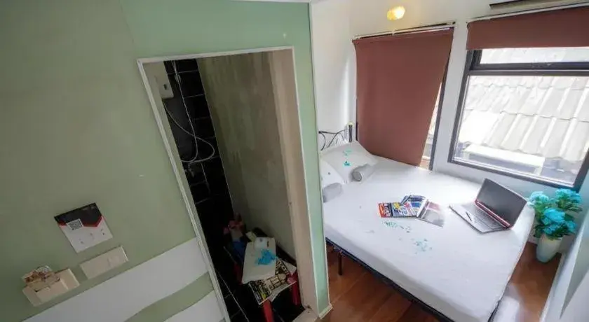 Bed in The Chilli Bangkok Hotel Bed in The Chilli Bangkok Hotel