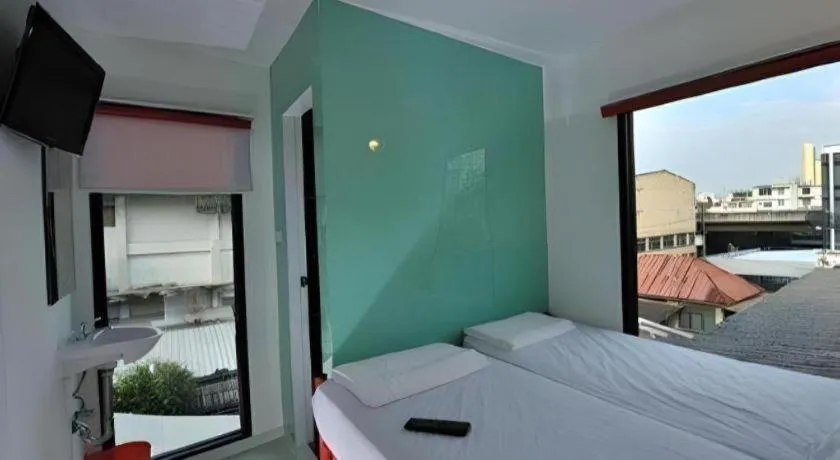 Bed in The Chilli Bangkok Hotel