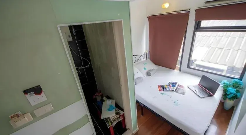 Bed in The Chilli Bangkok Hotel Bed in The Chilli Bangkok Hotel