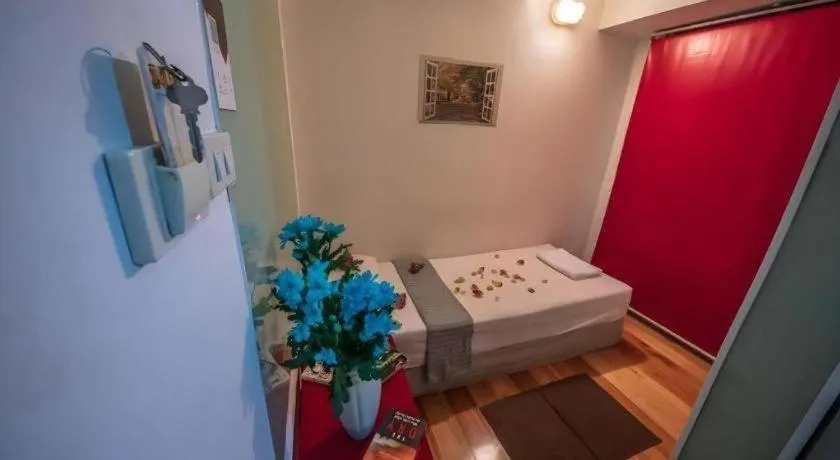 Bed in The Chilli Bangkok Hotel