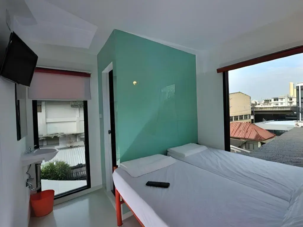 Bed in The Chilli Bangkok Hotel Bed in The Chilli Bangkok Hotel