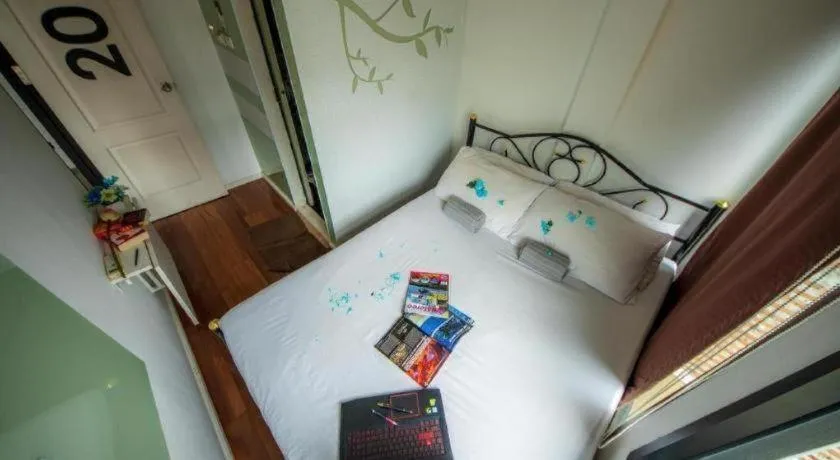 Bed in The Chilli Bangkok Hotel