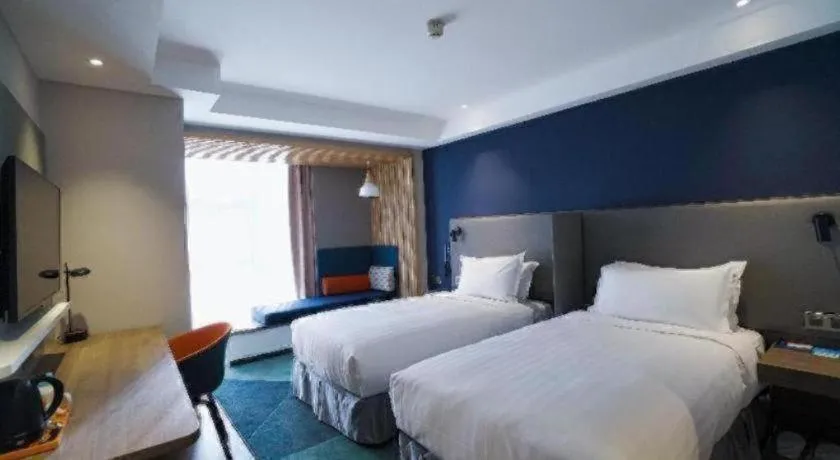 Bed in Holiday Inn Express Tianjin Dongli By IHG