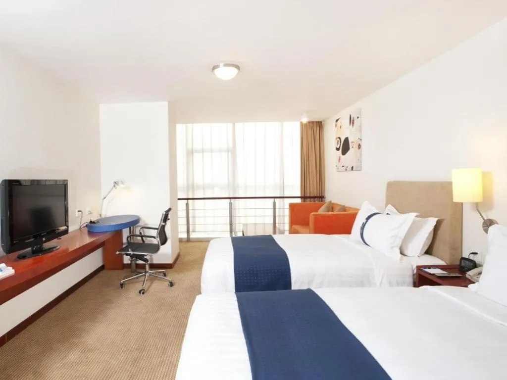 Bed in Holiday Inn Express Tianjin Dongli By IHG