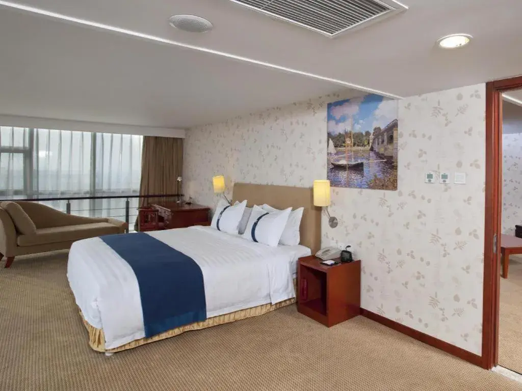 Bed in Holiday Inn Express Tianjin Dongli By IHG Bed in Holiday Inn Express Tianjin Dongli By IHG
