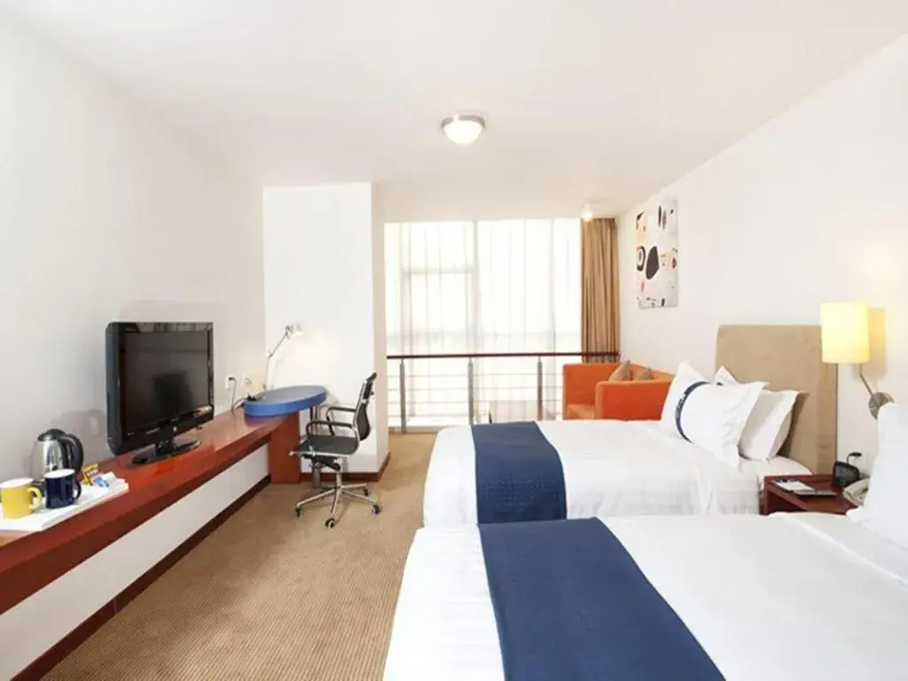 Bed in Holiday Inn Express Tianjin Dongli By IHG Bed in Holiday Inn Express Tianjin Dongli By IHG