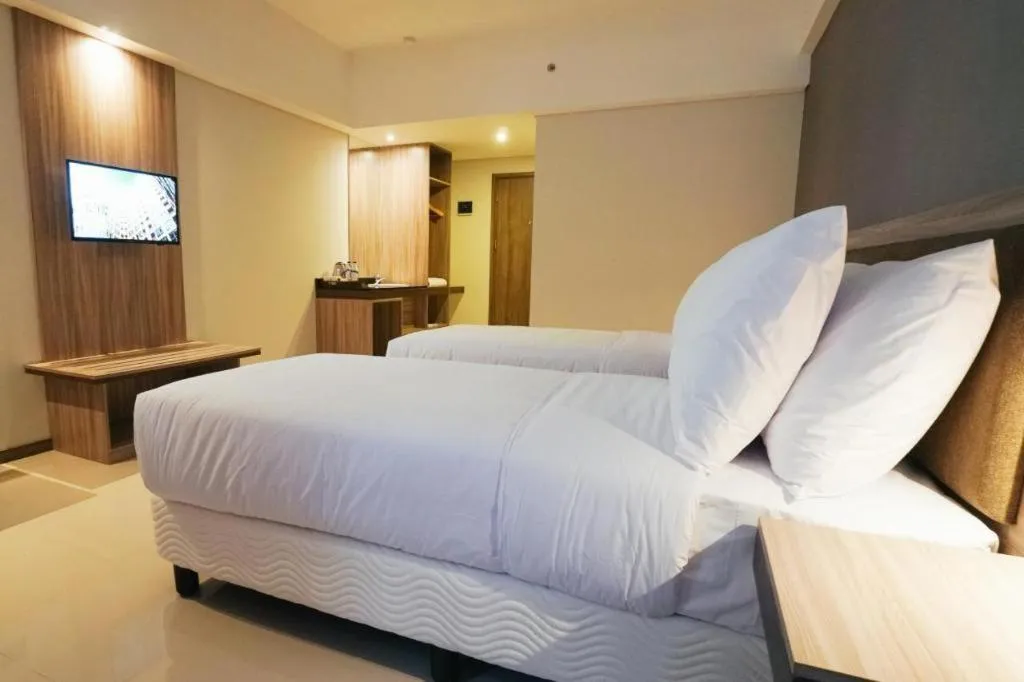 Bed in My Tower Hotel Surabaya