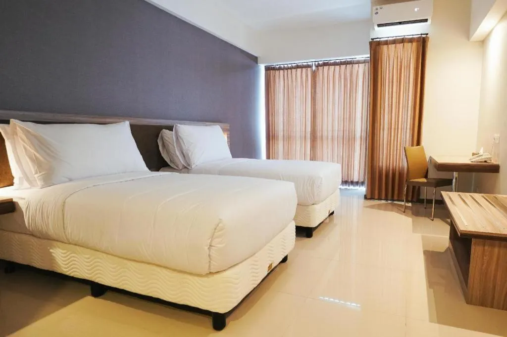 Bed in My Tower Hotel Surabaya