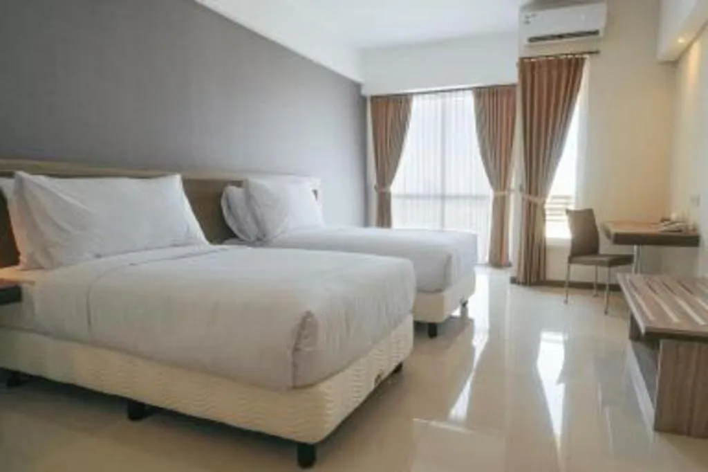 Bed in My Tower Hotel Surabaya