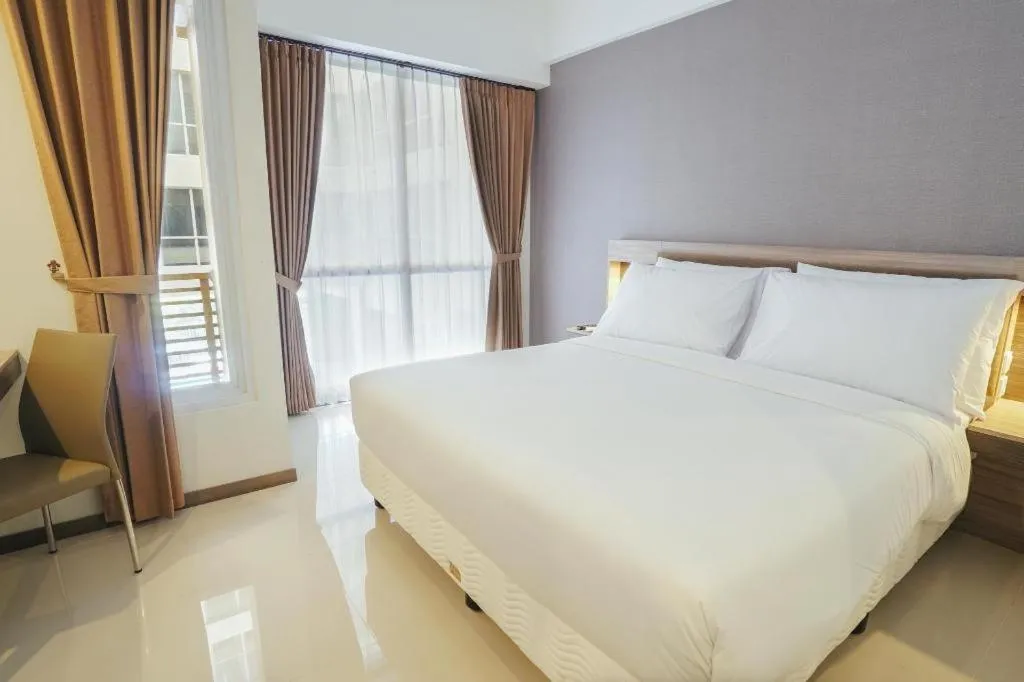 Bed in My Tower Hotel Surabaya