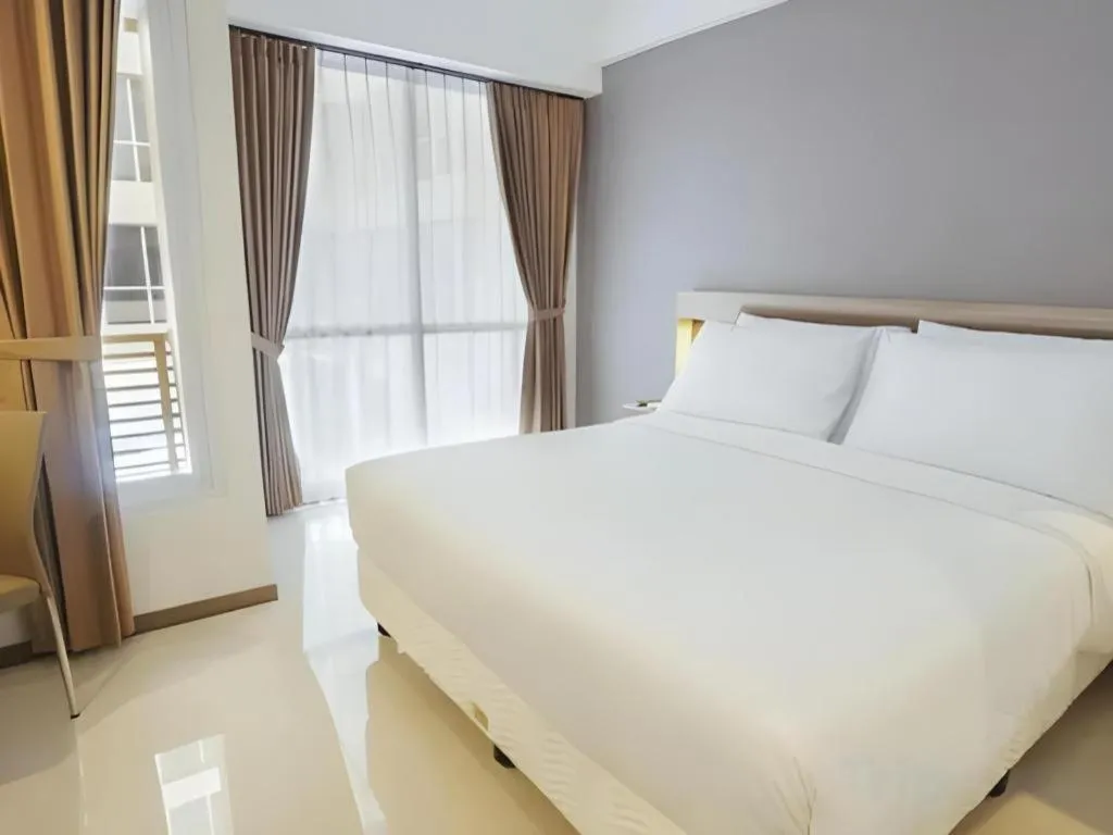 Bed in My Tower Hotel Surabaya
