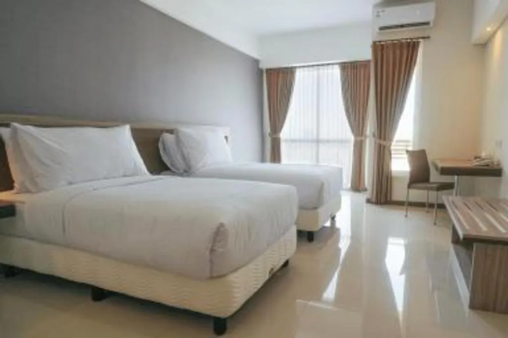 Bed in My Tower Hotel Surabaya