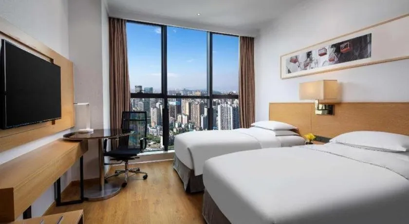 Bed in Ramada Encore by Wyndham Chongqing Yubei