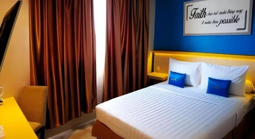 Bed in Zenith Hotel Bed in Zenith Hotel