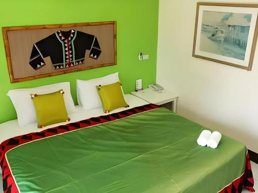 Bed in Phumanee Home Hotel Bed in Phumanee Home Hotel