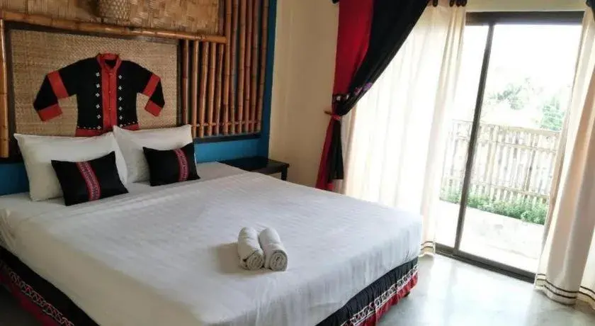 Bed in Phumanee Home Hotel Bed in Phumanee Home Hotel