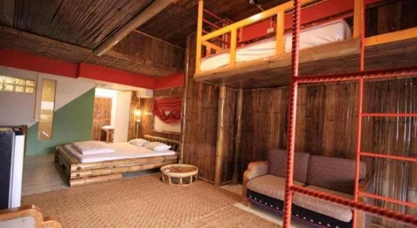 Bed in Phumanee Home Hotel