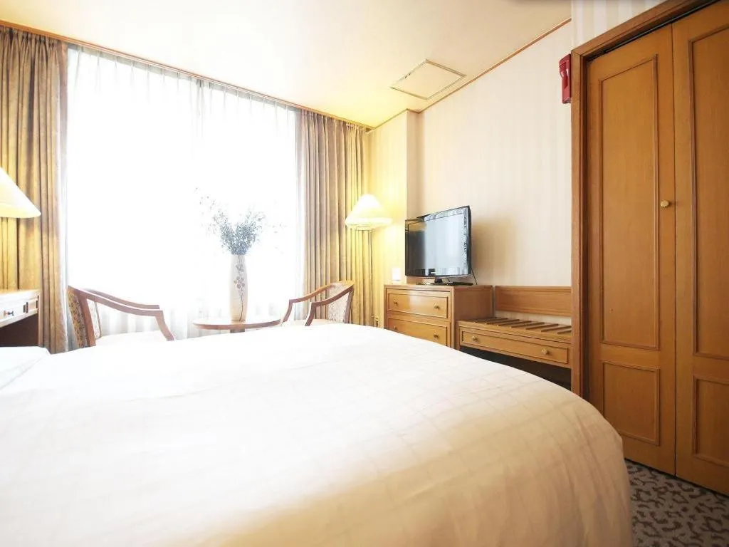 Bed in Seoul Rex Hotel