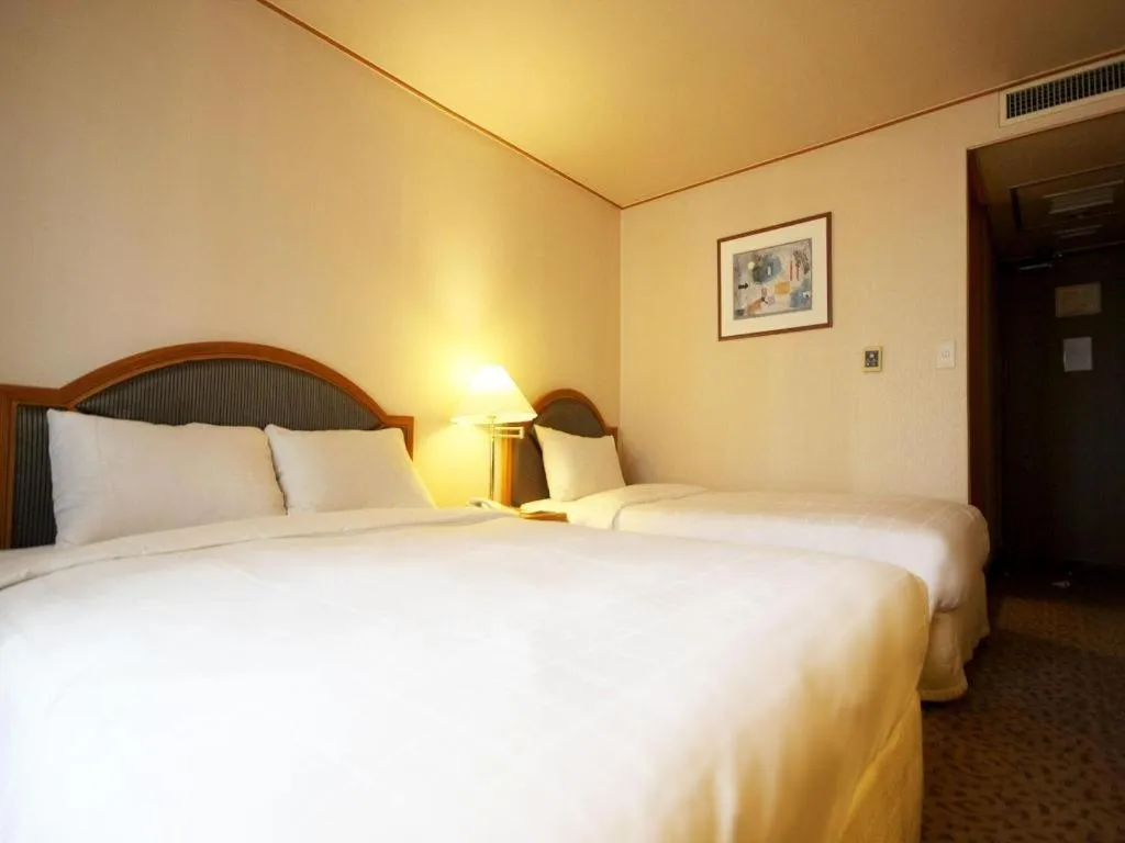 Bed in Seoul Rex Hotel