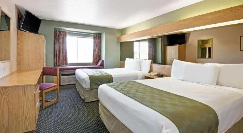 Bed in Microtel Inn & Suites by Wyndham Albuquerque West