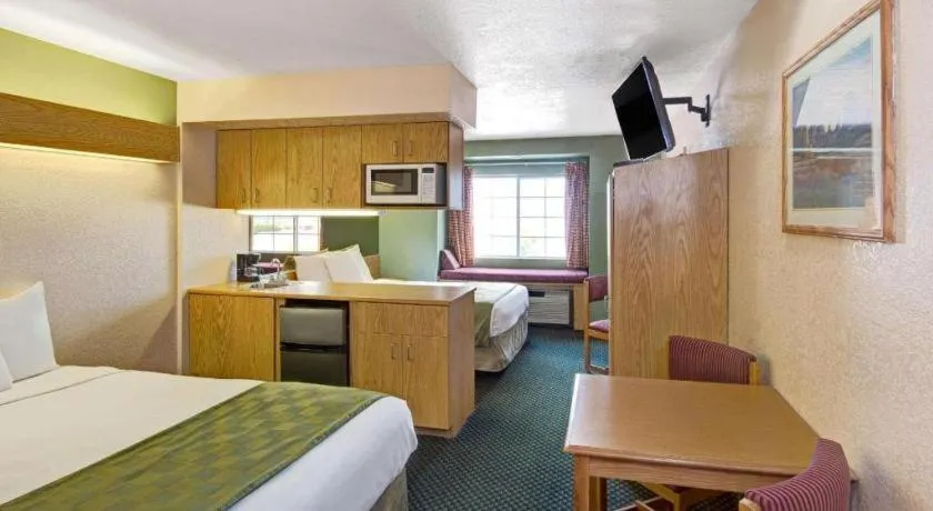 Bed in Microtel Inn & Suites by Wyndham Albuquerque West