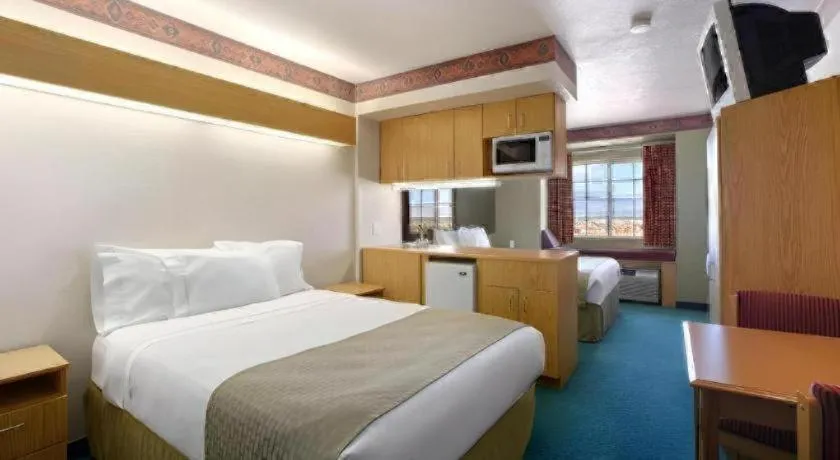 Bed in Microtel Inn & Suites by Wyndham Albuquerque West