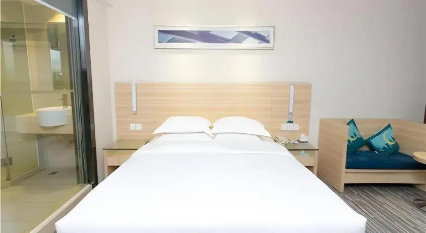 Bed in City Comfort Inn Jiangmen Xinhui Xiangshan Park Bed in City Comfort Inn Jiangmen Xinhui Xiangshan Park