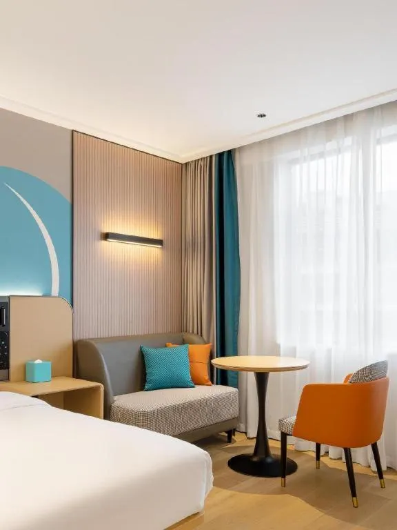 Bed in City Comfort Inn Jiangmen Xinhui Xiangshan Park