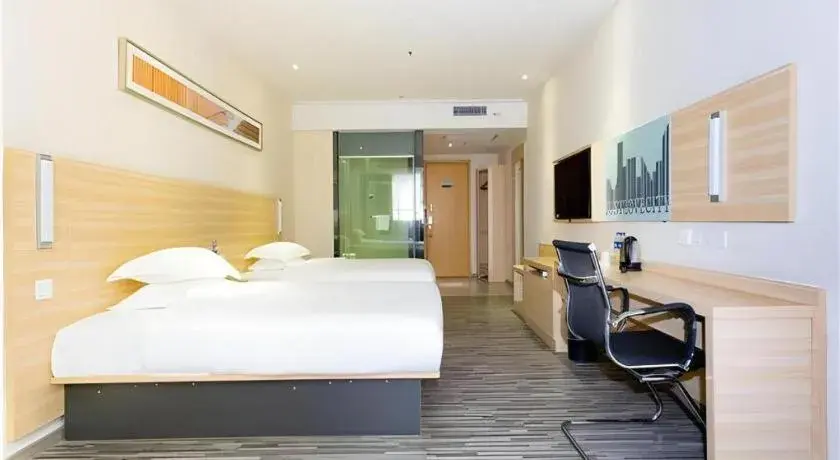 Bed in City Comfort Inn Jiangmen Xinhui Xiangshan Park Bed in City Comfort Inn Jiangmen Xinhui Xiangshan Park