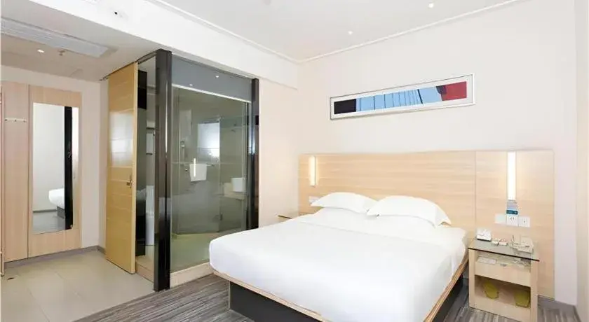 Bed in City Comfort Inn Jiangmen Xinhui Xiangshan Park Bed in City Comfort Inn Jiangmen Xinhui Xiangshan Park