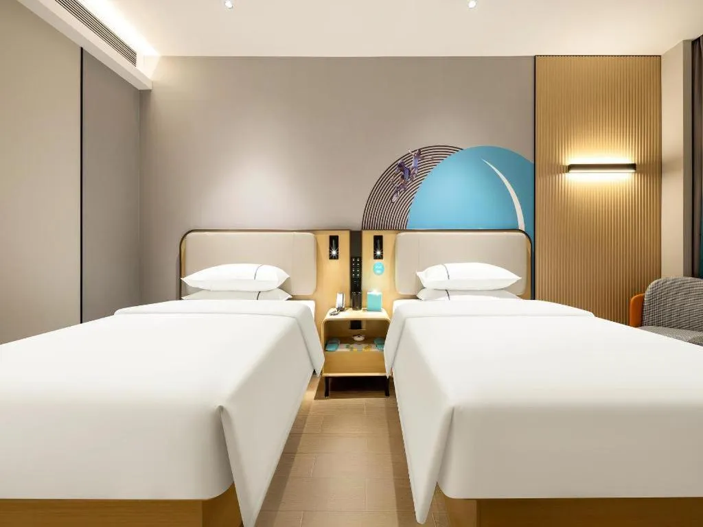 Bed in City Comfort Inn Jiangmen Xinhui Xiangshan Park