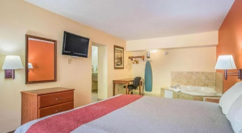 Bed in Rodeway Inn & Suites