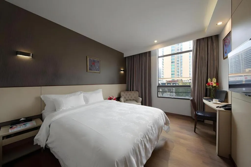 Bed in Hanyong Hotel Shenzhen International Exhibition Center