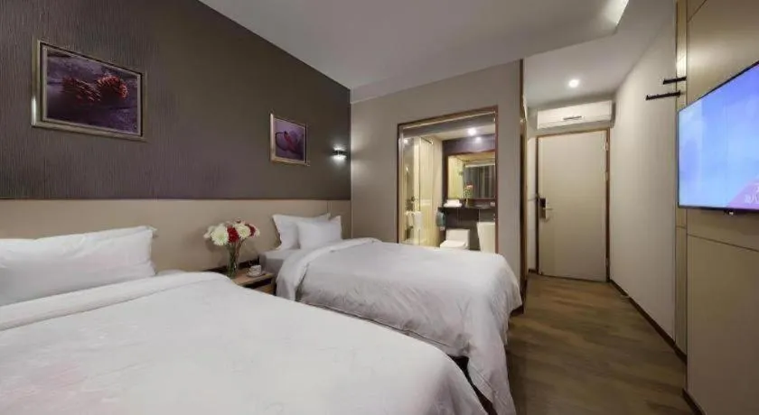 Bed in Hanyong Hotel Shenzhen International Exhibition Center