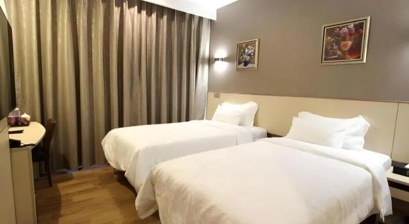 Bed in Hanyong Hotel Shenzhen International Exhibition Center