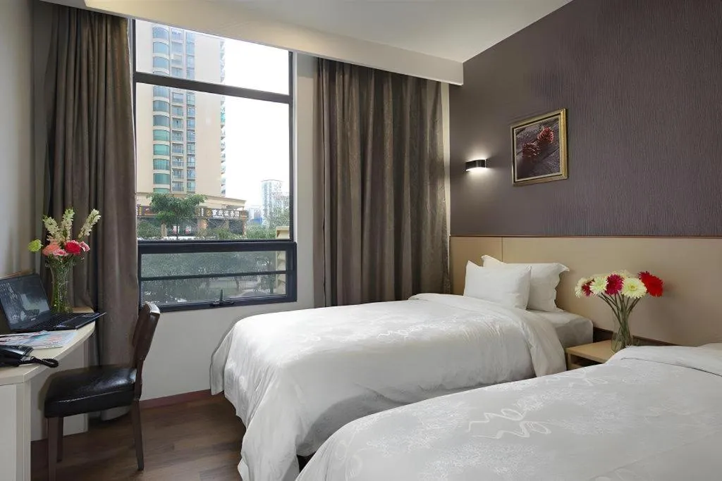 Bed in Hanyong Hotel Shenzhen International Exhibition Center