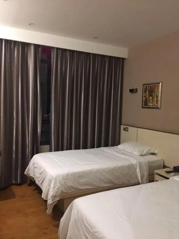 Bed in Hanyong Hotel Shenzhen International Exhibition Center