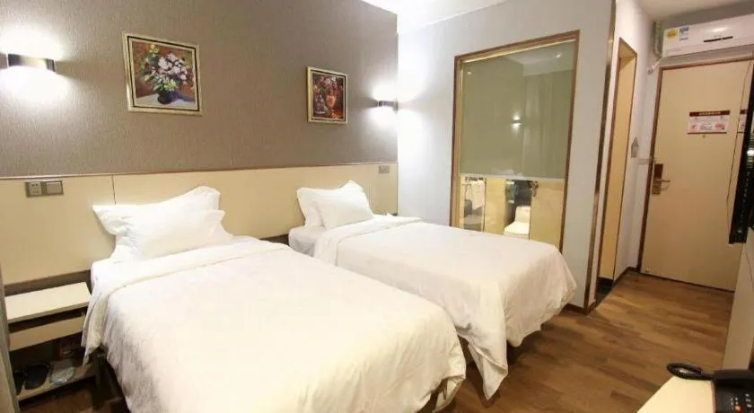 Bed in Hanyong Hotel Shenzhen International Exhibition Center