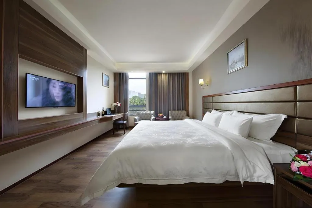 Bed in Hanyong Hotel Shenzhen International Exhibition Center