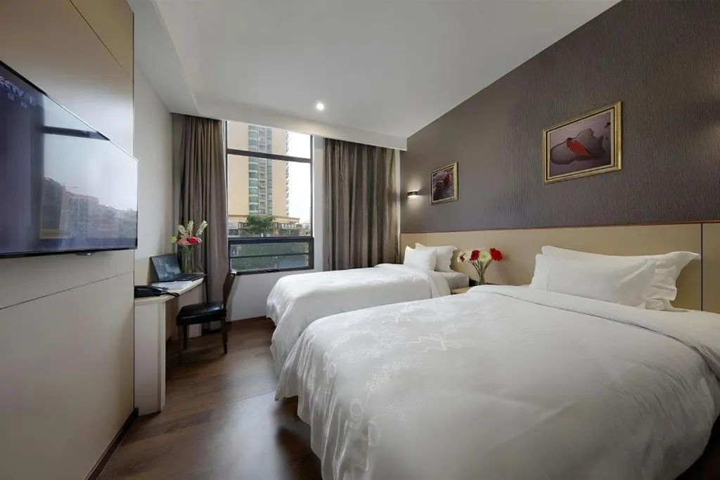 Bed in Hanyong Hotel Shenzhen International Exhibition Center