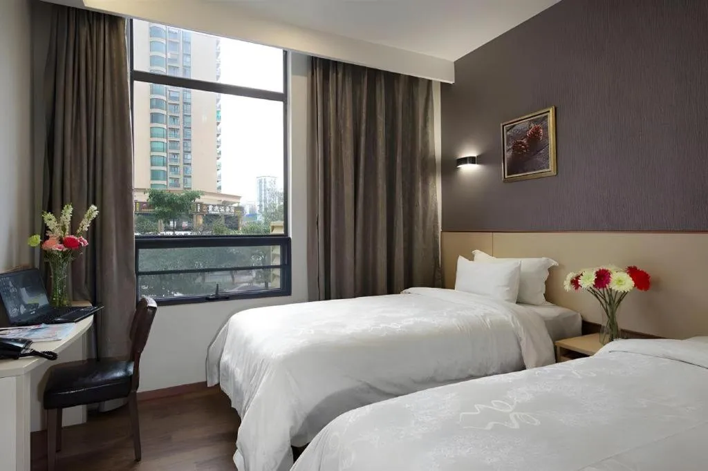 Bed in Hanyong Hotel Shenzhen International Exhibition Center